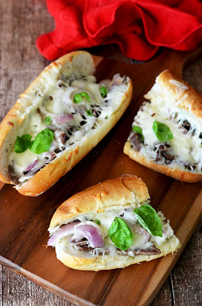 Ultimate Herbed Garlic Bread Cheesesteaks - Host The Toast