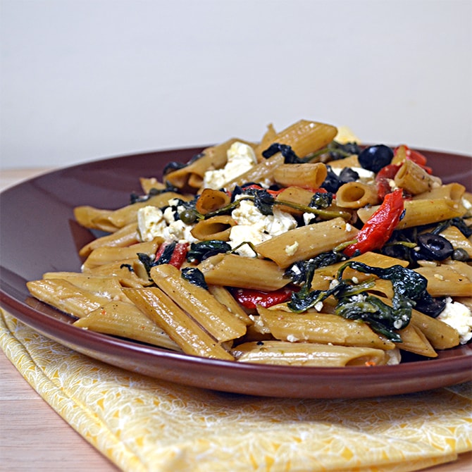 Pasta Greco-- Penne with feta cheese, spinach, olives, capers, and roasted red peppers