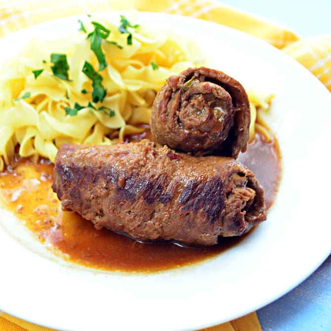 German Rouladen- Tender beef wrapped around pickles, onions, and bacon, all in a rich gravy