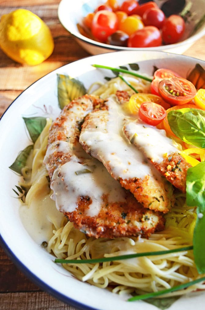 Parmesan Crusted Chicken with Herb Butter Sauce-- my most cooked recipe! Easy and impressive and oh so delicious.
