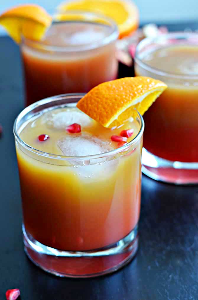 Tequila Sundown: tequila, orange juice, and pomegranate juice come together in this tasty cocktail!