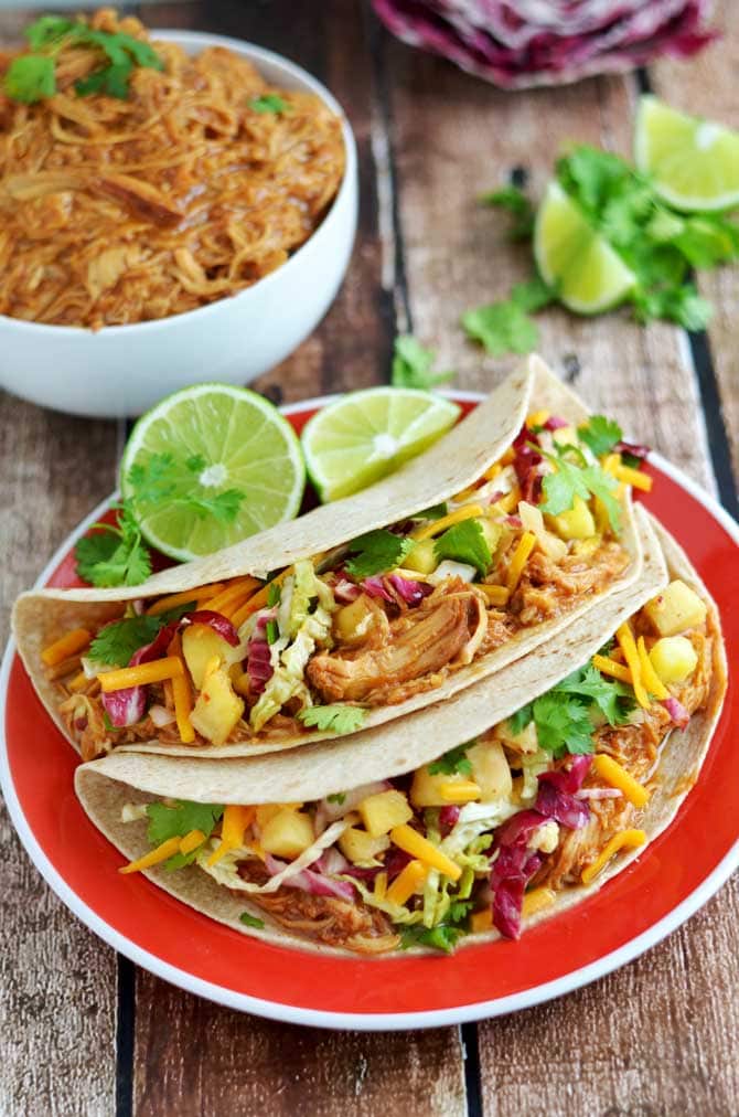 Crock Pot Hawaiian BBQ Chicken Tacos with Pineapple Slaw. Doesn't this just scream "summer" to you? | hostthetoast.com