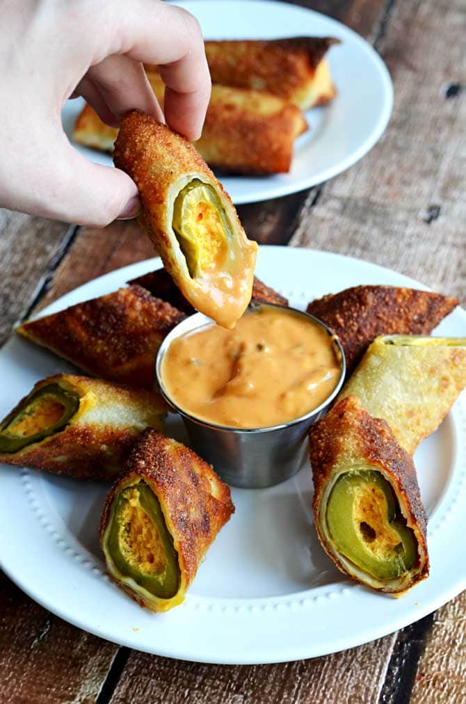 Fried Pickle Poppers.  These cheese-stuffed fried pickles are way easier to make than the typical deep-fried pickle chips, and they're even tastier!  Also, Chipotle Mayo Dip = delicious| hostthetoast.com 