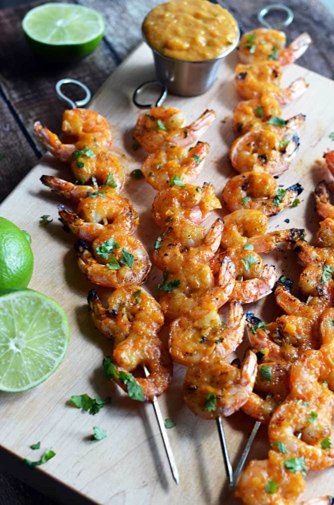 Mango Chile Glazed Shrimp.  Sweet, spicy, and grilled to perfection, these shrimp will be a new summer favorite! | hostthetoast.com