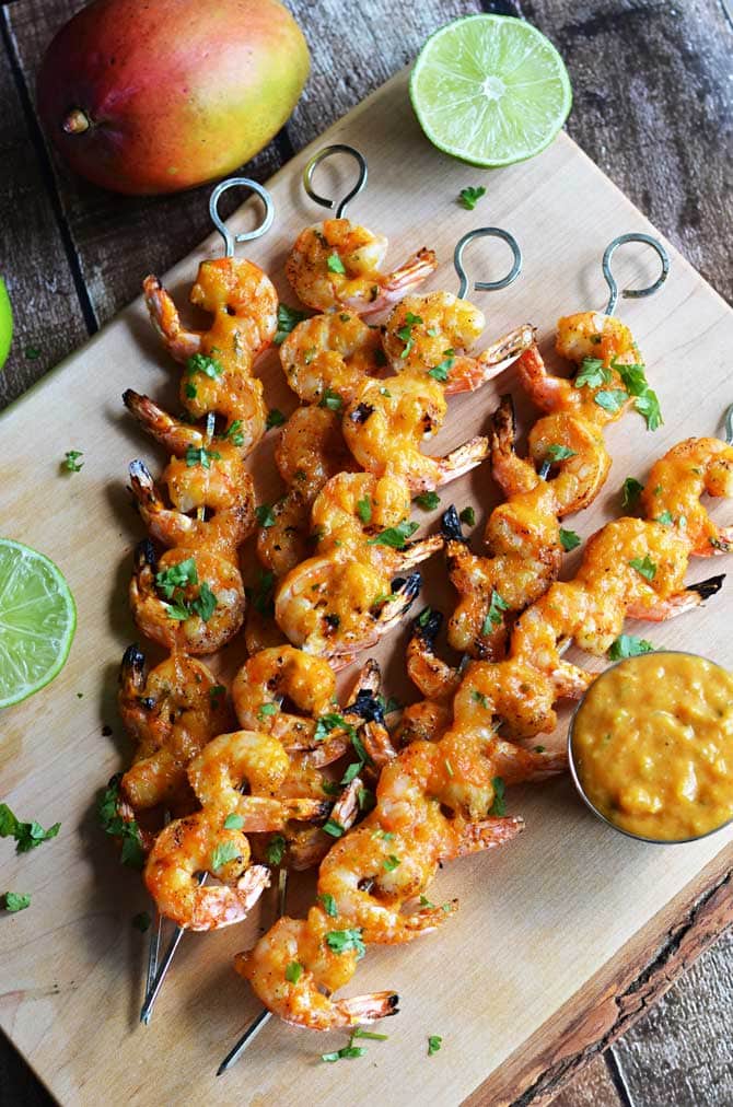 Mango Chile Glazed Shrimp.  Sweet, spicy, and grilled to perfection, these shrimp will be a new summer favorite! | hostthetoast.com