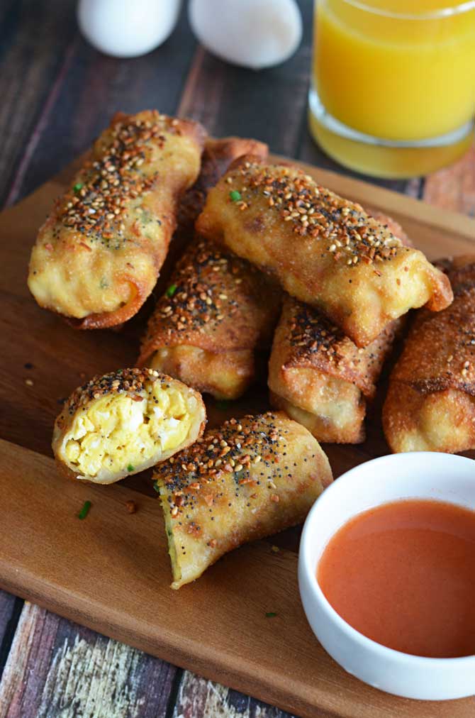 Bacon Egg & Cheese "Everything" Egg Rolls.  My new favorite breakfast.  My new favorite brunch.  My new favorite appetizer.  I seriously love these things and want to eat them 24/7.  | hostthetoast.com