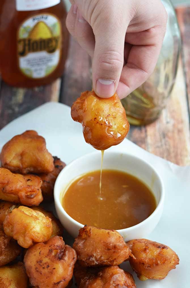 Maple Waffle Chicken Nuggets.  These chicken nuggets are coated in maple-y waffle batter and served with a honey maple mustard dip.  Perfect for parties or game day! | hostthetoast.com