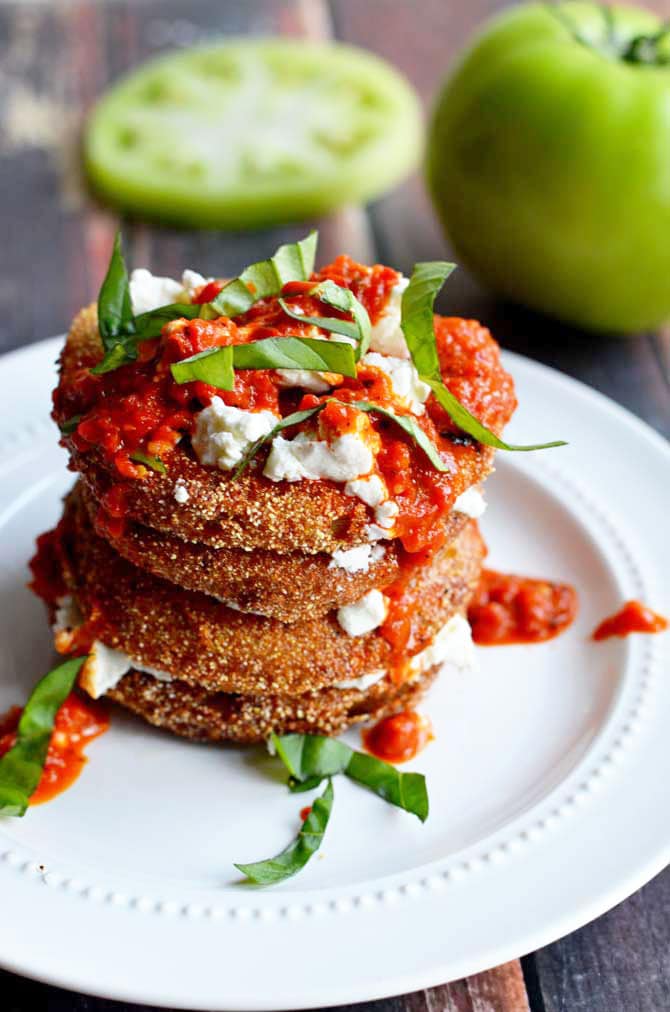 Fried Green Tomatoes with Goat Cheese and Roasted Red Pepper Vinaigrette.  This Southern-meets-Italian appetizer is bound to be a late-summer favorite.  I crave it all year long! | hostthetoast.com
