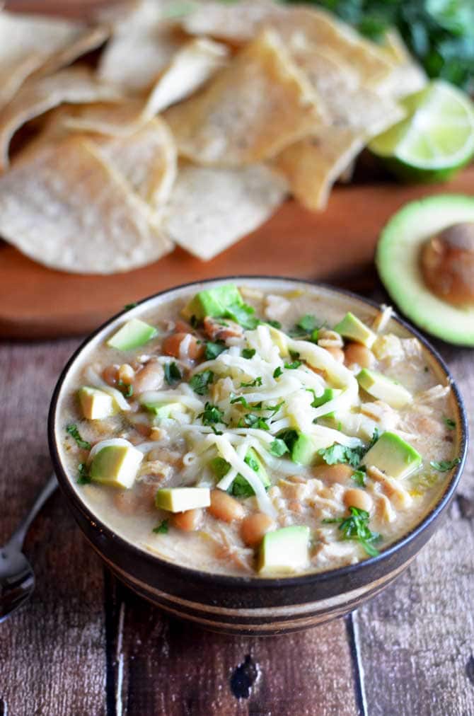 Crock Pot White Bean Chili.  This creamy white chili is absolutely delicious and easy to make in the slow cooker.  Also, it doesn't use any canned soups! | hostthetoast.com