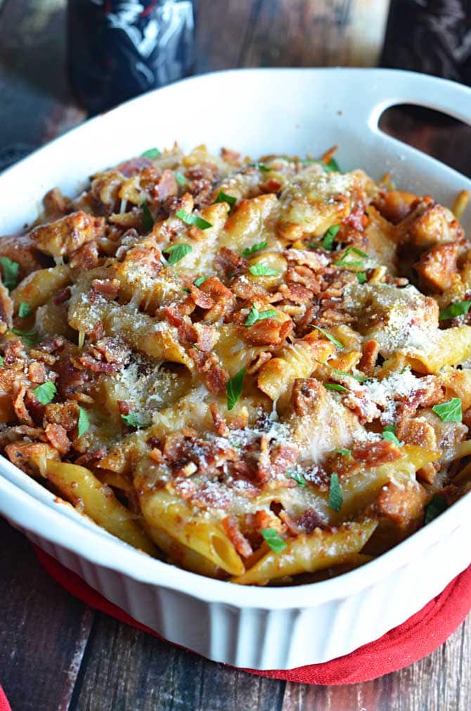 Smoky Sun-Dried Tomato Chicken Penne. Sun-dried tomatoes, ale, mustard, cream, bacon, chicken, garlic, parmesan, and smoked provolone.  Holy flavor! | hostthetoast.com