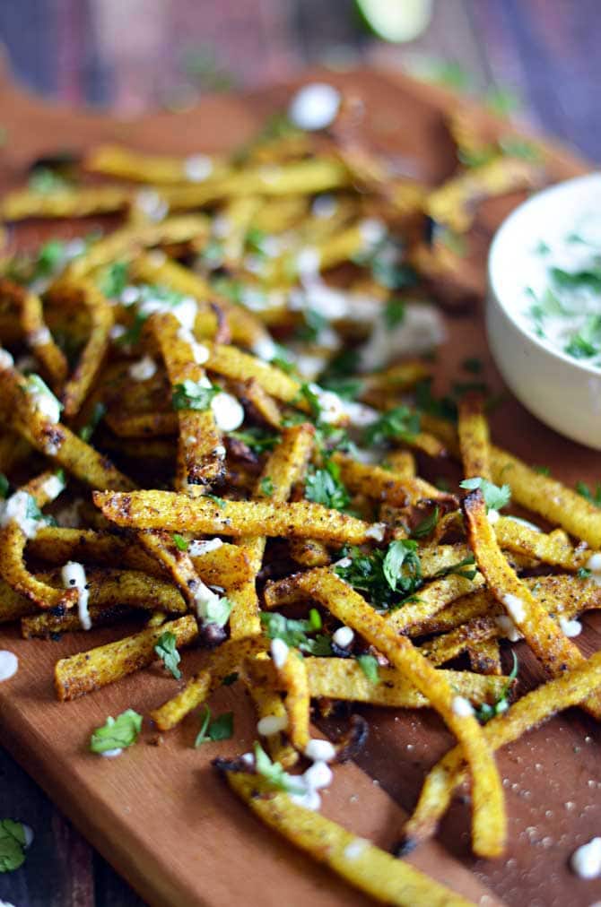 Spicy Baked Jicama Fries!  With less than half the calories of potatoes, jicama makes for a great, healthy side dish.  You'll love this guilt-free spin on french fries!  | hostthetoast.com
