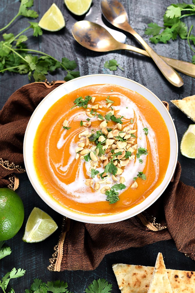 Thai Coconut Curry Butternut Squash Soup. Whether you make it in the slow cooker or on the stove top, you're going to love this flavorful, comforting, delicious fall soup. Dairy free, vegan-friendly, gluten free. | hostthetoast.com