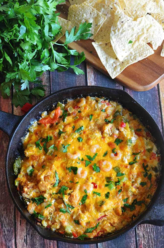 Cajun Shrimp Dip.  Amazing on bread or chips, and would work with crawfish or chicken, too!  Perfect as a game day appetizer this football season! | hostthetoast.com