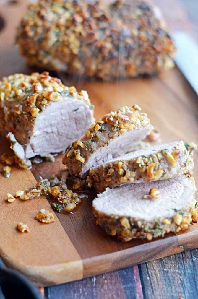 Walnut-Crusted Pork Tenderloin with Apple Cider Gravy.  Succulent, delicious, impressive, and surprisingly easier than you'd think.  Serve it with the Goat Cheese Chive Mashed Potatoes! | hostthetoast.com