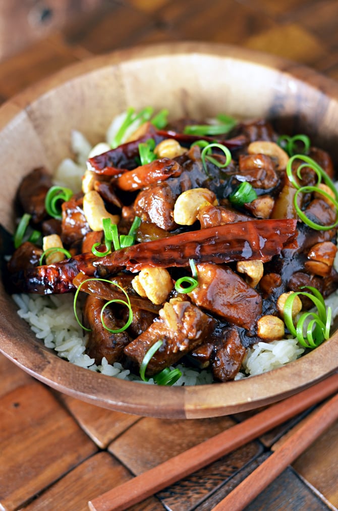 Crock Pot Kung Pao Chicken.   This is so delicious, and easy to throw together!  You can adjust the spice level to suit your own tastes, and add in more vegetables if you'd like.  All made in the slow cooker.  | hostthetoast.com