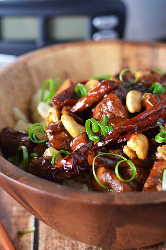 Crock Pot Kung Pao Chicken.   This is so delicious, and easy to throw together!  You can adjust the spice level to suit your own tastes, and add in more vegetables if you'd like.  All made in the slow cooker.  | hostthetoast.com