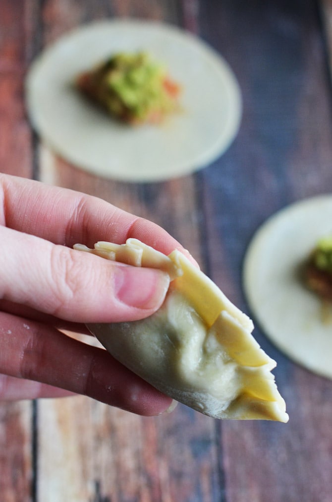 Chipotle Ranch Chicken & Avocado Potstickers with Cilantro-Lime Dip. Asian dumplings get a Tex Mex filling that's big on flavor in appetizer-sized servings. | hostthetoast.com