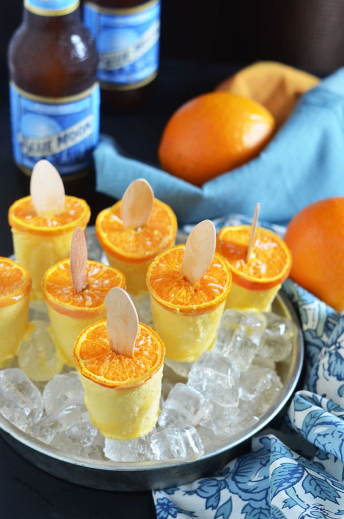 Blue Moon Orange Creamsicles. These boozy popsicles will be the star of your BBQ or party! Easy to make, too! | hostthetoast.com