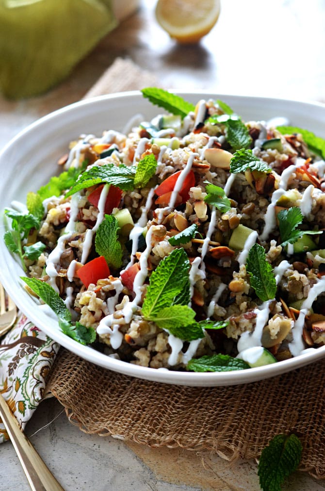 Indian Spiced Rice & Lentil Salad. Forget the same old pasta salad for your next potluck. This flavorful rice salad is going to be a hit. Plenty of fresh ingredients keep it bright, while garlic, jalapeno, ginger, and spices give it depth that everyone's going to love. | hostthetoast.com