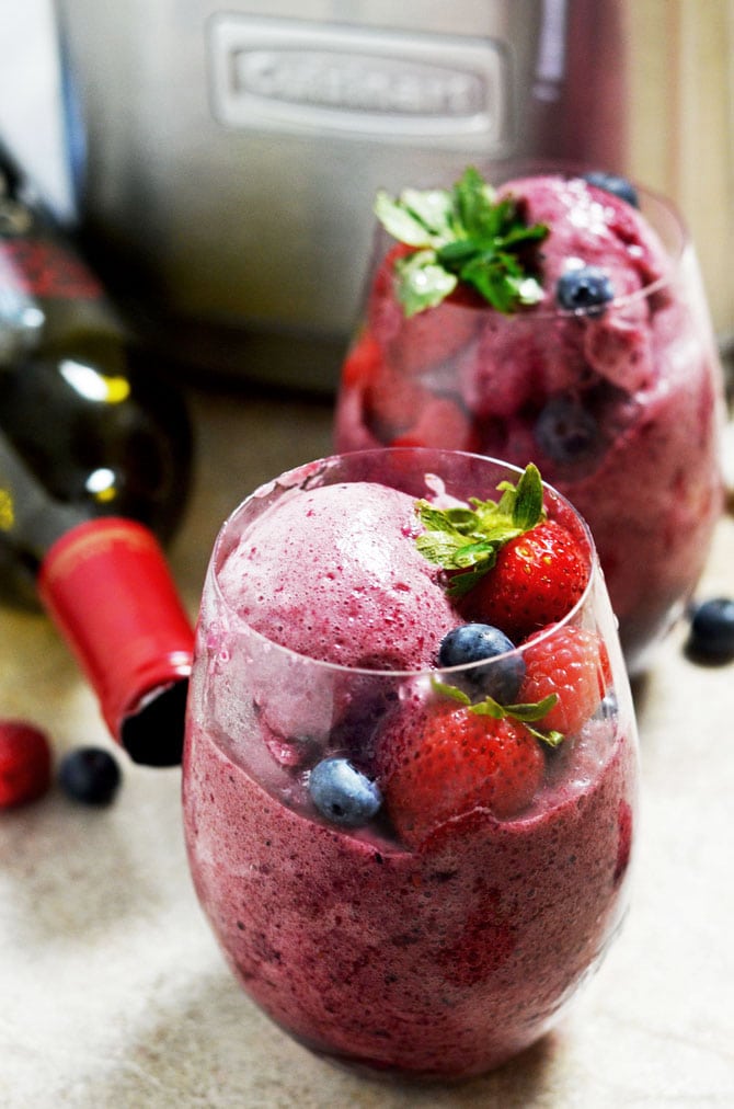 Sangria Sorbet! This boozy summer treat packs a punch! Imagine soaking up the sun with a glass of this stuff... perfect, right? | hostthetoast