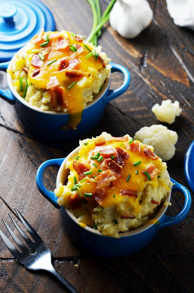 Loaded Mashed Cauliflower. Cheesy, creamy, mashed cauliflower with plenty of bacon that's low on calories. Perfect for a low carb alternative to mashed potatoes! | hostthetoast.com