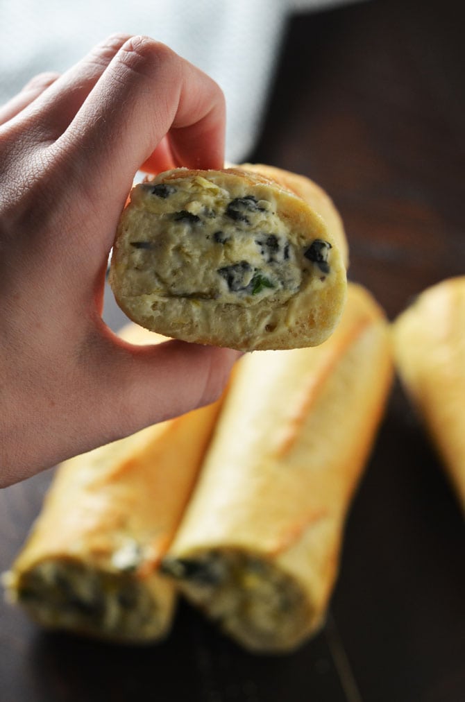 Spinach and Artichoke Dip Stuffed Garlic Bread. This is everything you've ever wanted in an appetizer and more. | hostthetoast.com