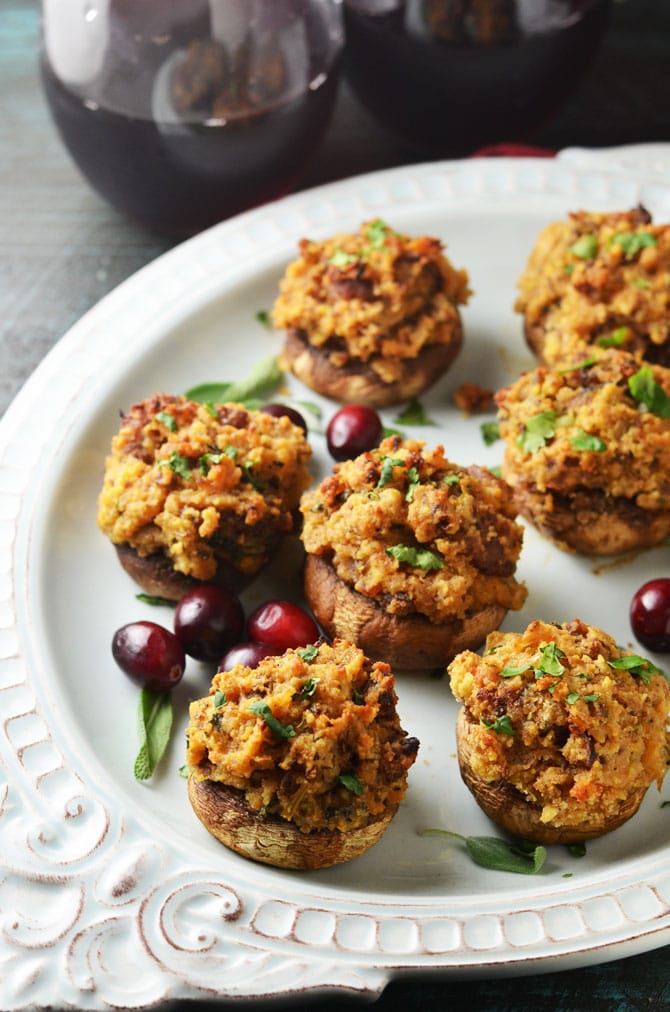 Stuffing Stuffed Mushrooms. These mushrooms are filled with a cornbread and breakfast sausage stuffing that is SO flavorful you can't help but scarf these down. Great for Thanksgiving or any occasion when you need a delicious appetizer. Can be made ahead, to boot! | hostthetoast.com