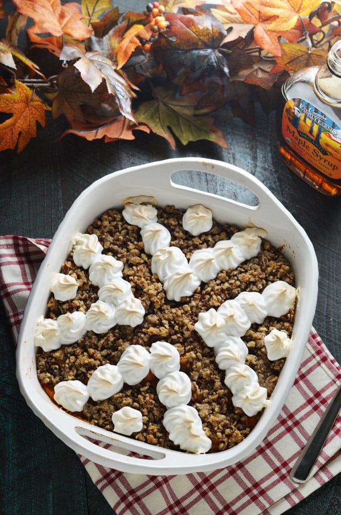 Ultimate Sweet Potato Casserole. Rich and sweet but not overwhelming, this sweet potato casserole features roasted sweet potatoes, maple syrup, pecan streusel, and easy marshmallow meringue. It's a new Thanksgiving favorite for my family! | hostthetoast.com