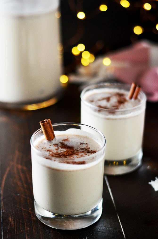 Coquito (Puerto Rican Eggnog). This Christmas cocktail is full of delicious coconut, cinnamon, vanilla, and rum. Make it for parties or bottle it as holiday gifts! | hostthetoast.com