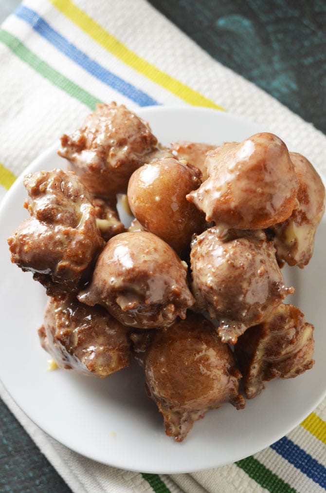 Easy Applesauce Drop Doughnuts with Caramel Glaze. These delicious doughnut bites come together so quickly and easily, you'll want to whip them up all the time! Great for a special breakfast treat or Hanukkah dessert. | hostthetoast.com