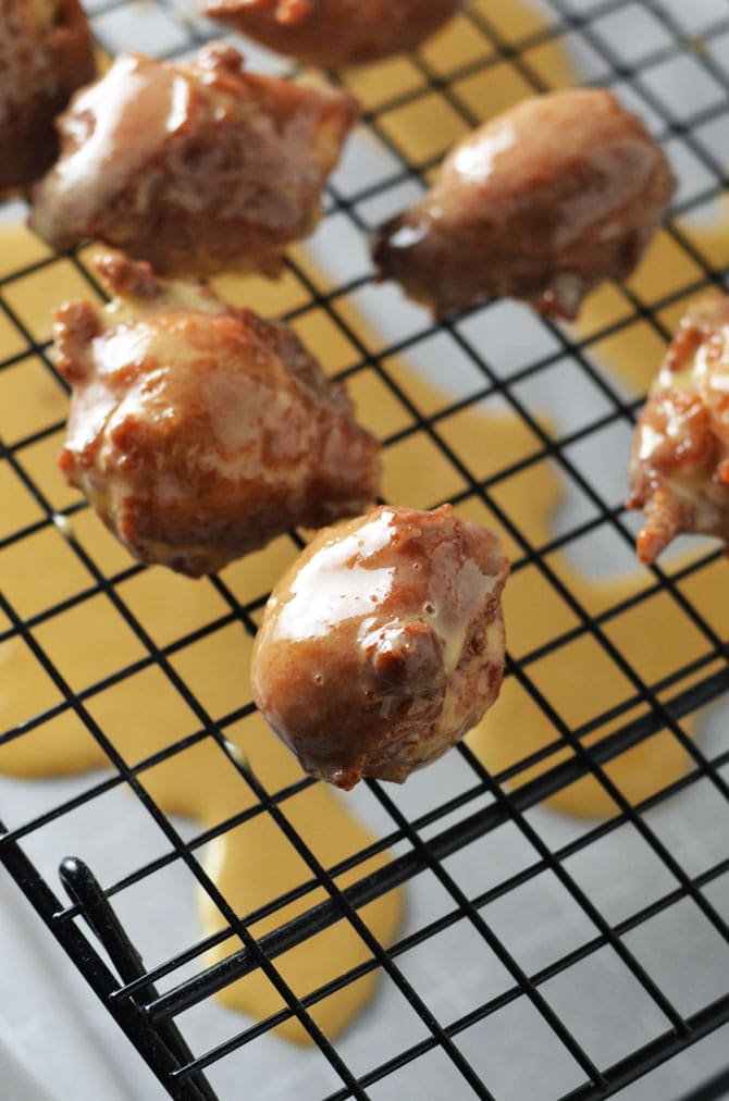 Easy Applesauce Drop Doughnuts with Caramel Glaze. These delicious doughnut bites come together so quickly and easily, you'll want to whip them up all the time! Great for a special breakfast treat or Hanukkah dessert. | hostthetoast.com