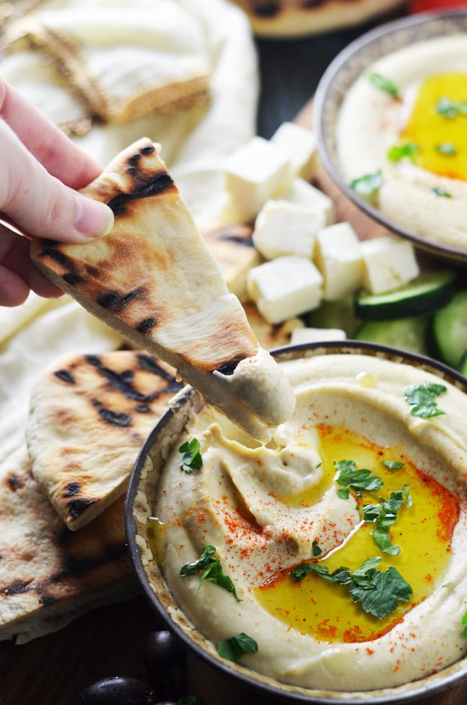 Michael Solomonov's Perfect Hummus Tehina. If you're searching for the best homemade hummus that doesn't require a ton of effort, then this recipe is for you. It doesn't get better than this dip. | hostthetoast.com