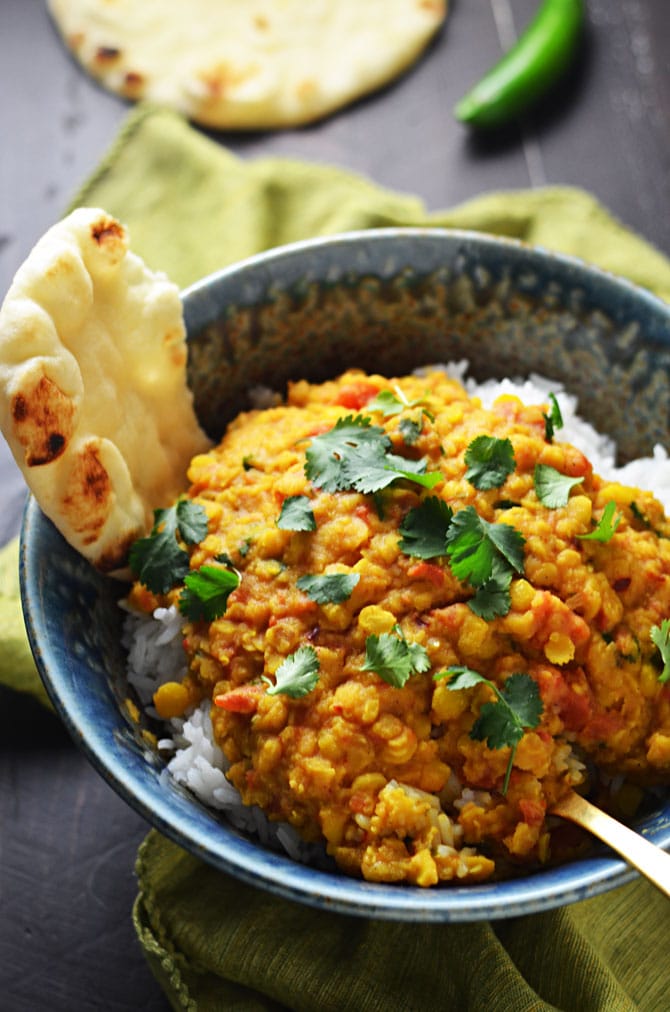 Slow Cooker Indian-Spiced Lentils. This crock pot dahl recipe is hearty, heavily spiced, and ultra-comforting. It doesn't require any crazy techniques, but winds up so flavorful! | hostthetoast.com