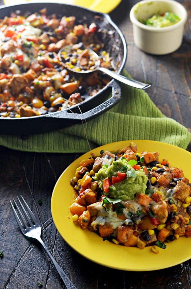 Southwestern Chicken and Sweet Potato Skillet. This is my new go-to weeknight dinner. Spicy, cheesy, and full of healthy ingredients. | hostthetoast.com
