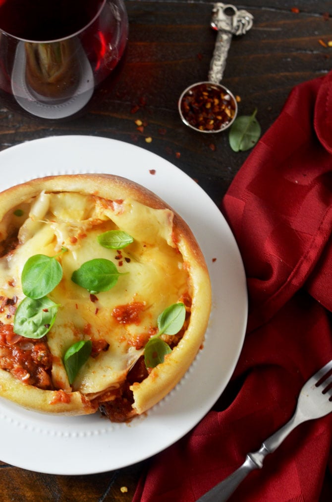 Pizza Bowls. Tomato sauce, sausage, and two types of cheese are nestled into bowls, covered with pizza dough, and flipped to reveal individual pizza dinners that will rock your tastebuds. | hostthetoast.com