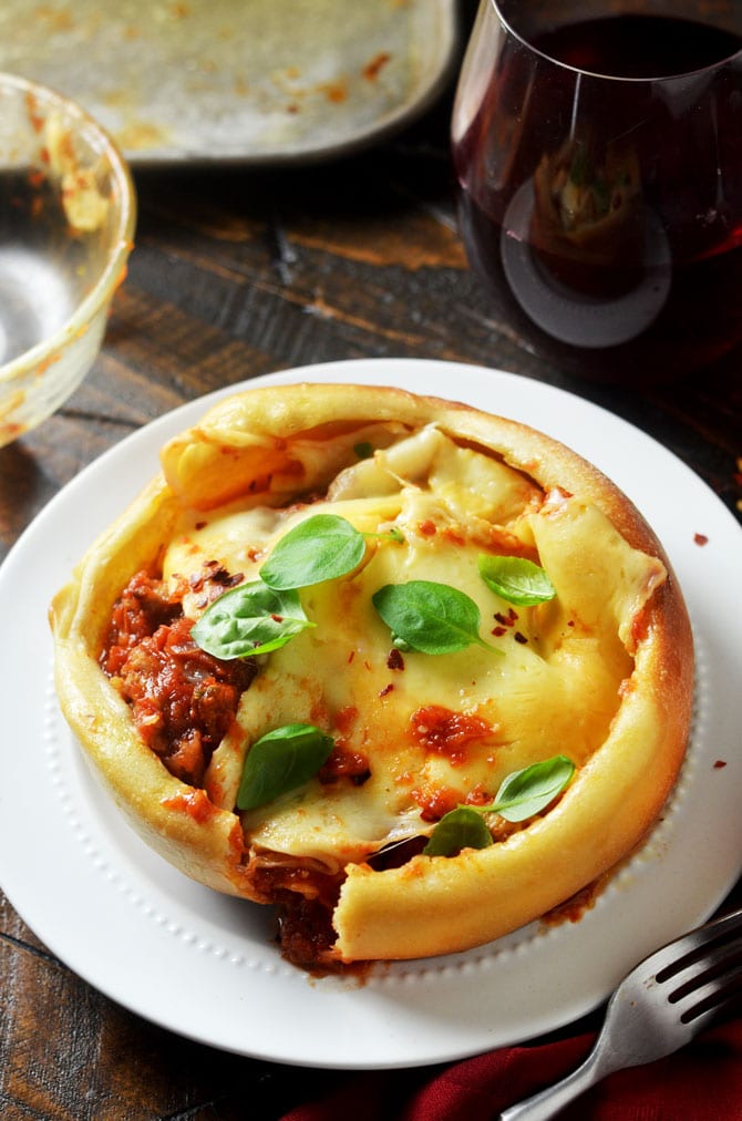 Pizza Bowls. Tomato sauce, sausage, and two types of cheese are nestled into bowls, covered with pizza dough, and flipped to reveal individual pizza dinners that will rock your tastebuds. | hostthetoast.com