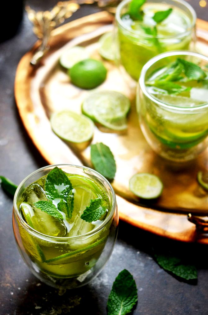Melon Whiskey Ginger. This simple cocktail features midori melon liqueur, Jameson whiskey, ginger ale, lime wheels, and fresh mint. It's perfect for St. Patrick's Day, and delicious enough to become a go-to summer drink as well! | hostthetoast.com