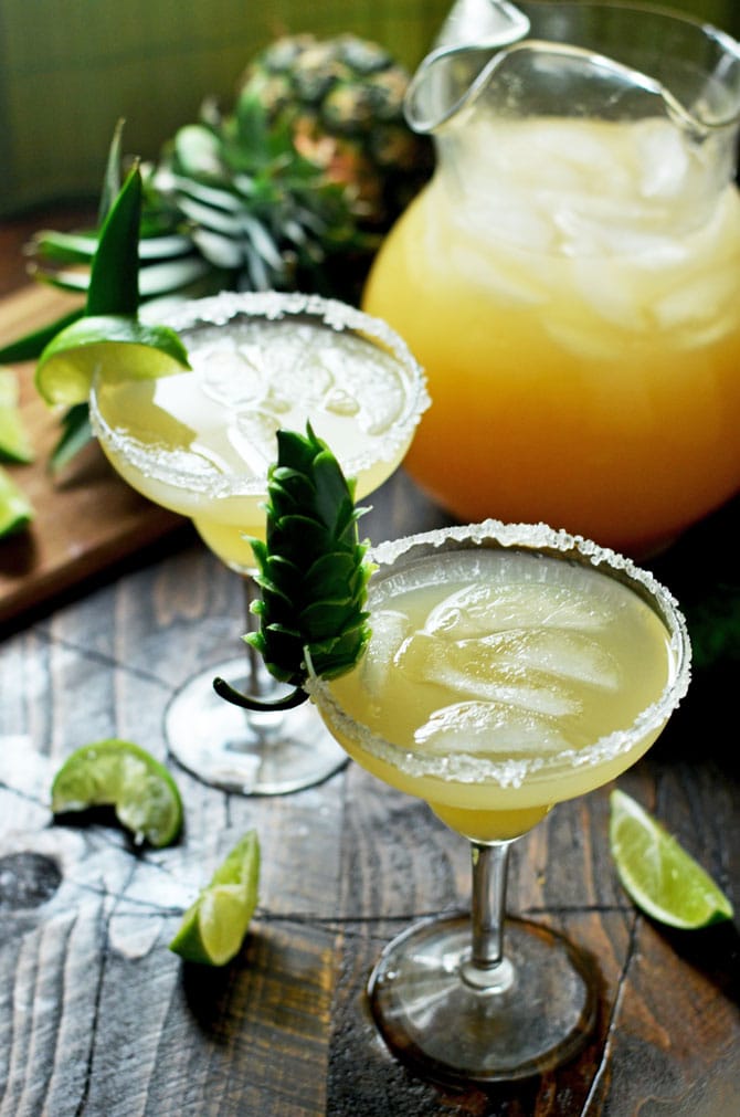 Caramelized Pineapple and Jalapeño Margaritas. Sweet, spicy, and citrus flavors come together in this refreshing cocktail. | hostthetoast.com