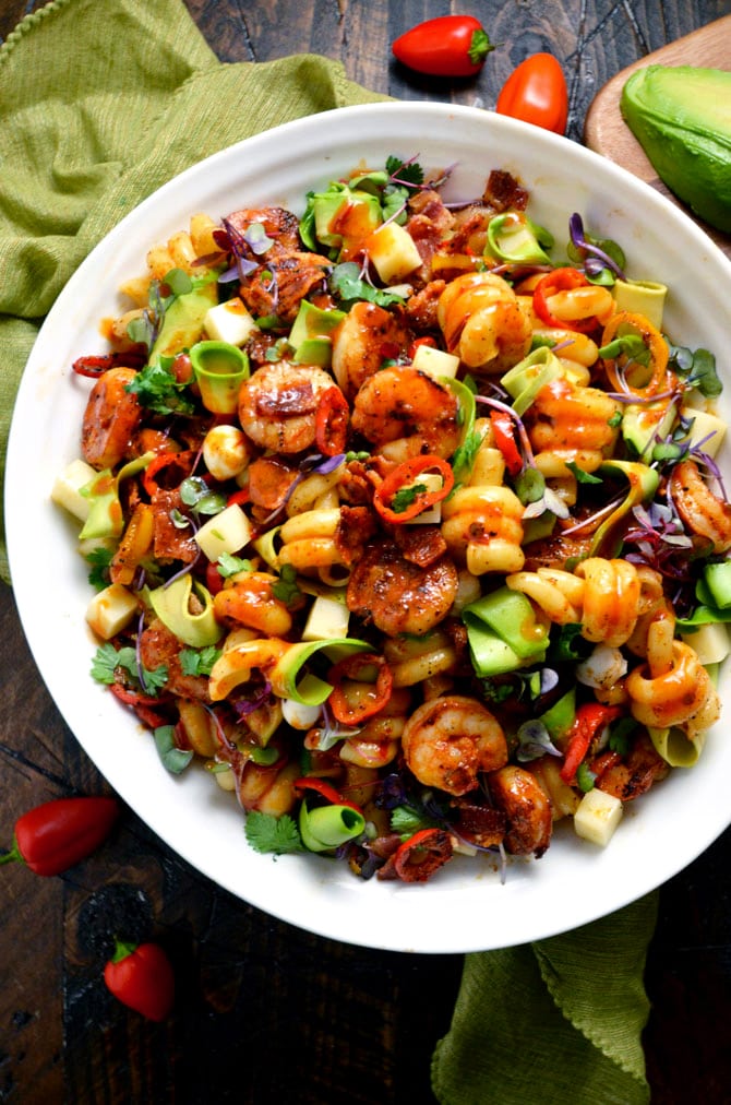 Smoky Shrimp Pasta Salad with Chipotle-Honey Vinaigrette. This is the holy grail of pasta salad, guys. Bring this to a barbecue or picnic and it'll be the star of the show, I guarantee you that. Those avocado ribbons just melt in your mouth. | hostthetoast.com