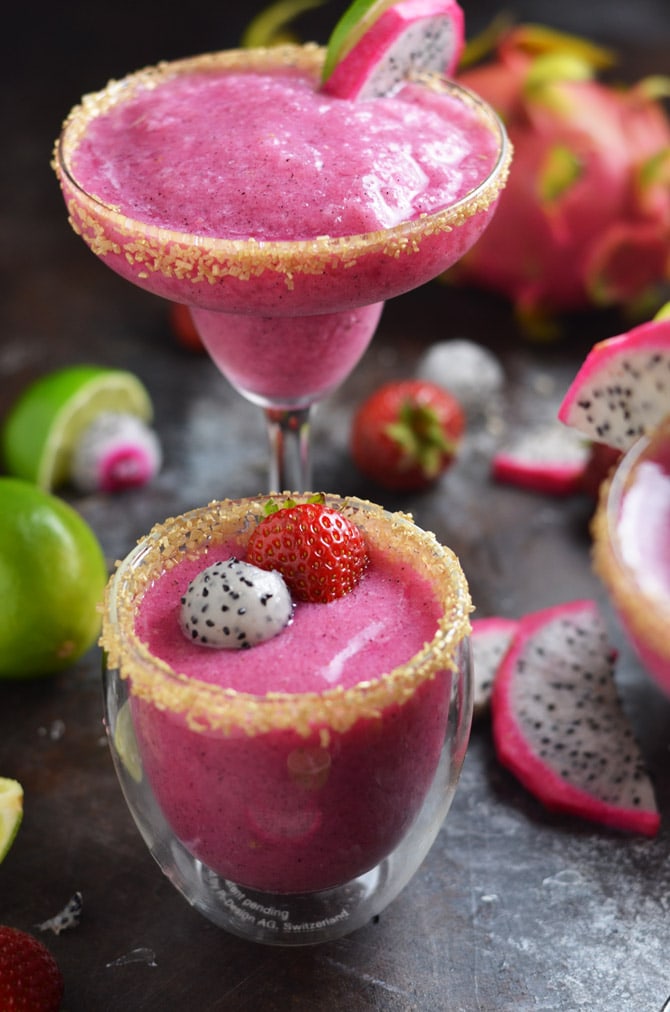 Strawberry Dragon Fruit Margaritas. These vibrant magenta frozen margaritas are just as tasty as they are pretty. You've gotta try 'em. | hostthetoast.com
