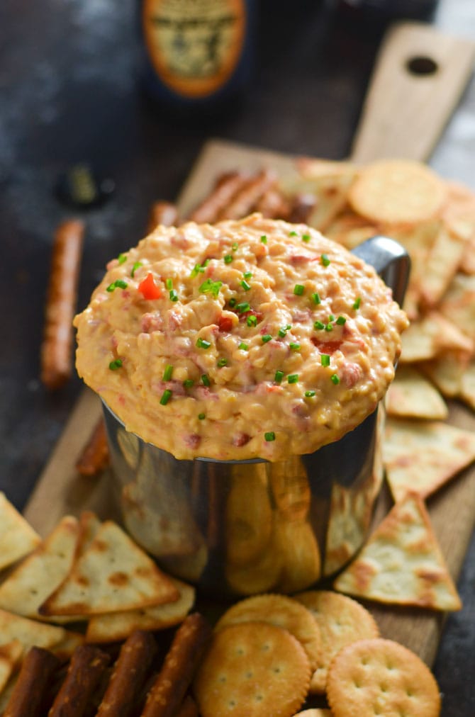 15 Minute Pimento Beer Cheese. This tangy, smoky, ultra-cheesy dip is exactly what you need for your next party. It's so simple to whip together, but huge on flavor, and tastes great at any temperature. | hostthetoast.com
