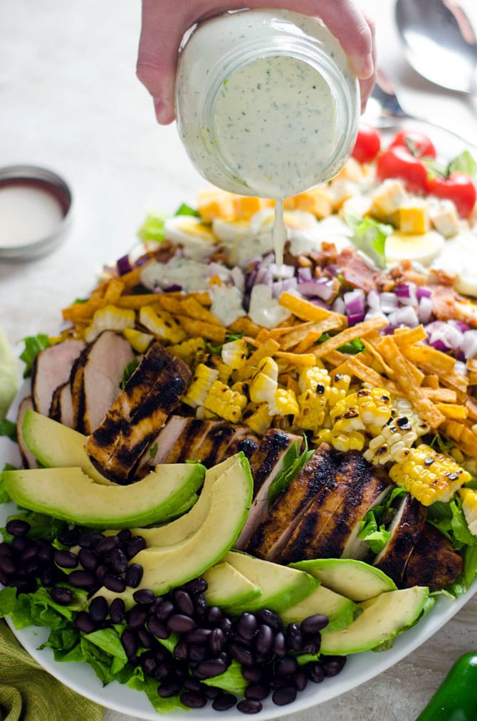 Southwestern Chicken Cobb Salad with Jalapeño Buttermilk Ranch. A spiced-up twist on the classic cobb, and one of my favorite all-time salads. | hostthetoast.com