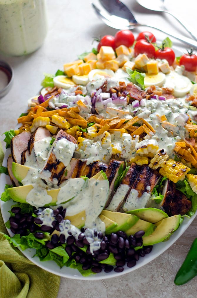 Southwestern Chicken Cobb Salad with Jalapeño Buttermilk Ranch. A spiced-up twist on the classic cobb, and one of my favorite all-time salads. | hostthetoast.com