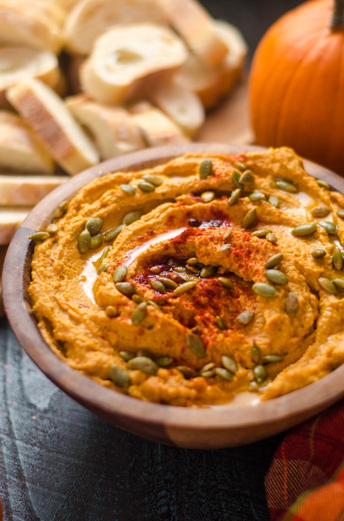 Smoky Chipotle Pumpkin Hummus. This quick, easy, and flavorful fall appetizer is perfect for party food or a Thanksgiving snack. | hostthetoast.com
