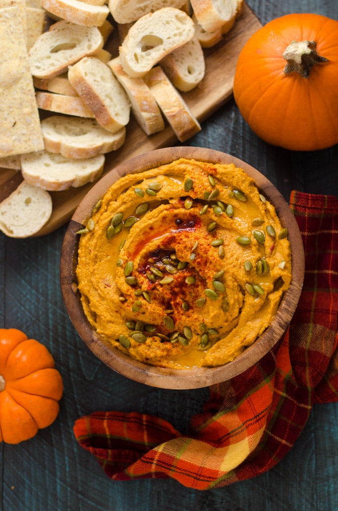 Smoky Chipotle Pumpkin Hummus. This quick, easy, and flavorful fall appetizer is perfect for party food or a Thanksgiving snack. | hostthetoast.com
