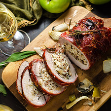 Prosciutto-Wrapped Pork Loin with Apple & Rice Stuffing - Host The Toast