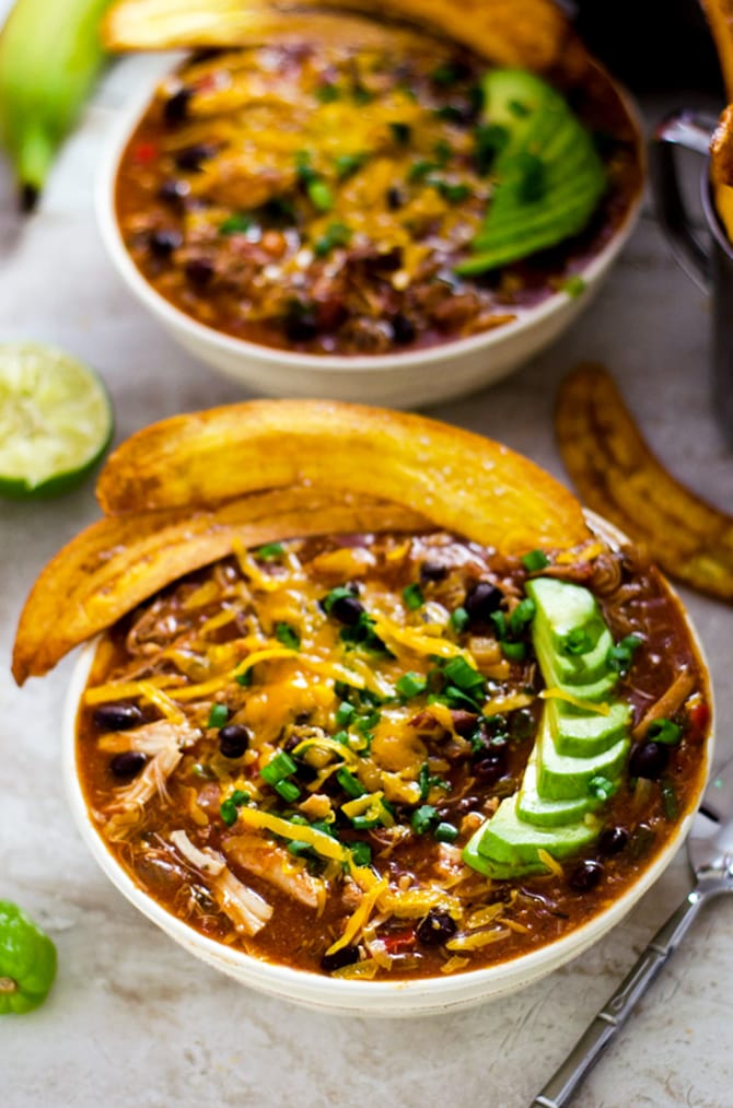 Slow Cooker Jamaican Jerk Chicken Chili with Plantain Chips. This set-it-and-forget-it shredded chicken chili takes island flavor straight to your bowl. | hostthetoast.com