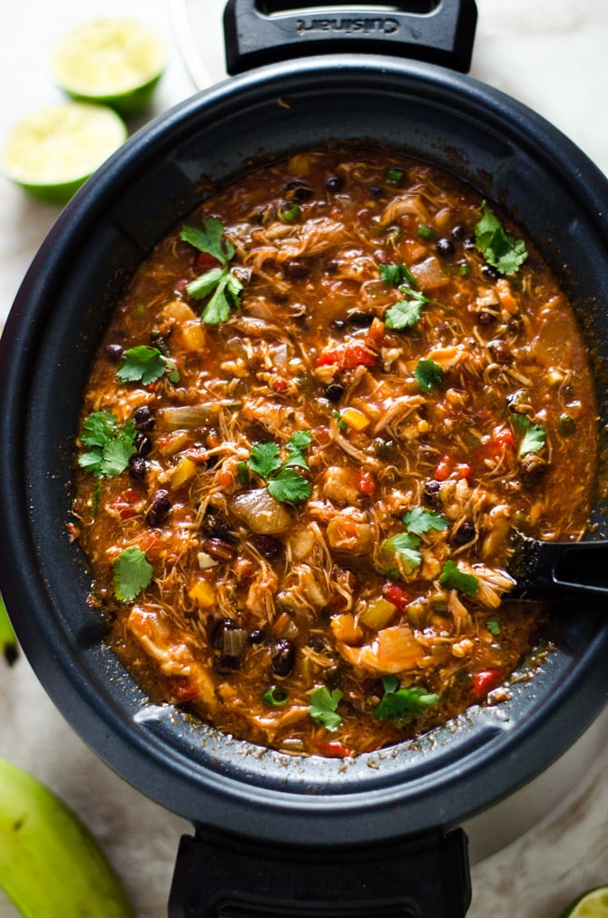 Slow Cooker Jamaican Jerk Chicken Chili with Plantain Chips. This set-it-and-forget-it shredded chicken chili takes island flavor straight to your bowl. | hostthetoast.com