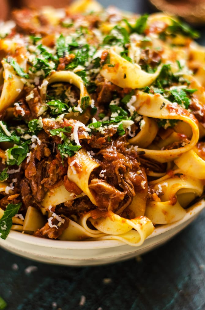 Slow Cooker Short Rib Ragu with Horseradish Gremolata. You'd be hard-pressed to find a more delicious ragu than this recipe. Hearty, bold, and ultra-comforting, it will become a slow cooker staple for the chilly season! | hostthetoast.com