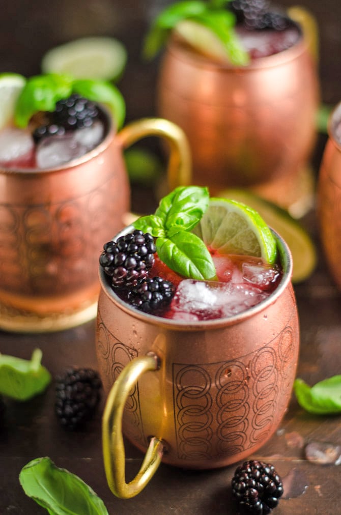 Blackberry Basil Moscow Mules. If you're a Moscow Mule fan, you're going to love this vibrant, simple spin on the popular cocktail! | hostthetoast.com